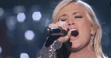 listen to carrie underwood how great thou art How does Carrie Underwood's powerful vocals and heartfelt lyrics resonate with the theme of 'how great thou art', often sung during religious services and hymns?